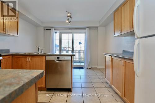 2761 Bur Oak Avenue, Markham, ON - Indoor Photo Showing Kitchen With Double Sink