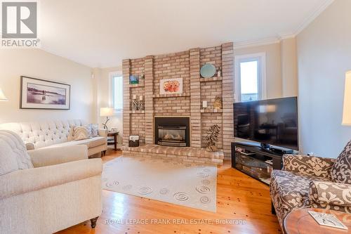 1 Dunsford Court, Kawartha Lakes (Lindsay), ON - Indoor Photo Showing Living Room With Fireplace