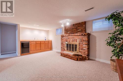 1 Dunsford Court, Kawartha Lakes (Lindsay), ON - Indoor With Fireplace