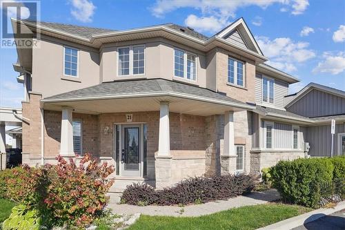 View of front of house featuring a porch - 21 White Star Lane, Grimsby, ON 