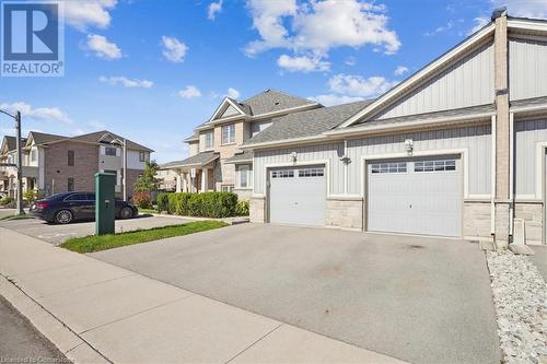 View of front of house featuring a garage - 21 White Star Lane, Grimsby, ON 