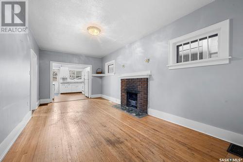 2109 Winnipeg Street, Regina, SK - Indoor Photo Showing Living Room With Fireplace