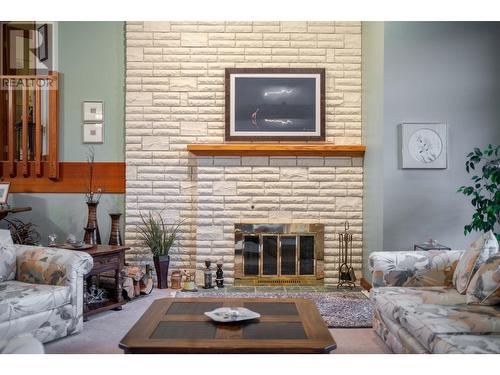 3023 Westside Road, Moyie, BC - Indoor Photo Showing Living Room With Fireplace