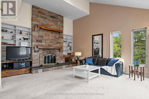 130 Factory Lane, Loyalist (Bath), ON - Indoor Photo Showing Living Room With Fireplace