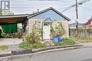 Bungalow-style house featuring a carport - 97 Evans Street, Hamilton, ON 