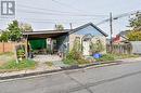 View of front of house featuring a carport - 97 Evans Street, Hamilton, ON 