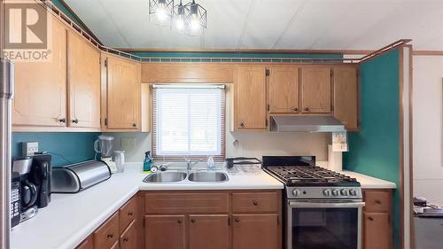 9910 Northville Crescent Unit# A-52, Lambton Shores, ON - Indoor Photo Showing Kitchen With Double Sink