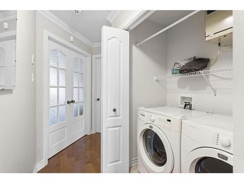 Salle de lavage - 102-651 Rue Jacques-Lavigne, Sainte-Thérèse, QC - Indoor Photo Showing Laundry Room