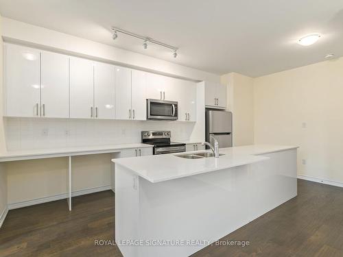 7B Clintwood Gate, Toronto, ON - Indoor Photo Showing Kitchen With Double Sink