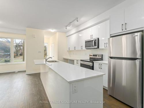 7B Clintwood Gate, Toronto, ON - Indoor Photo Showing Kitchen With Double Sink With Upgraded Kitchen