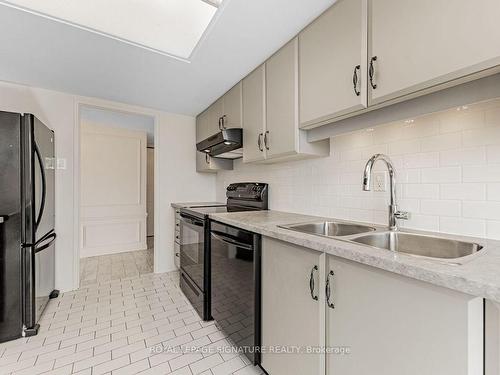 255 The Donway  W, Toronto, ON - Indoor Photo Showing Kitchen With Double Sink