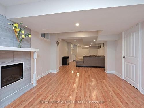 Lower-62 Ferris Lane, New Tecumseth, ON - Indoor Photo Showing Living Room With Fireplace