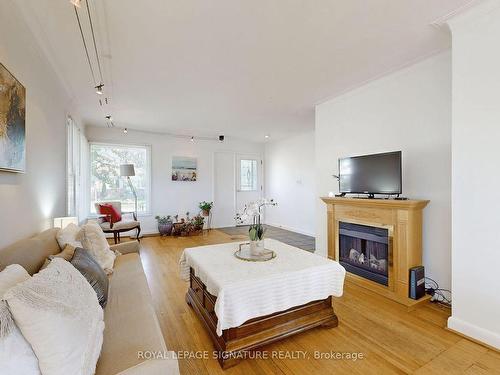 420 St Augustine Dr, Oakville, ON - Indoor Photo Showing Living Room With Fireplace