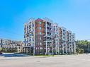 308-125 Canon Jackson Dr, Toronto, ON  - Outdoor With Balcony With Facade 