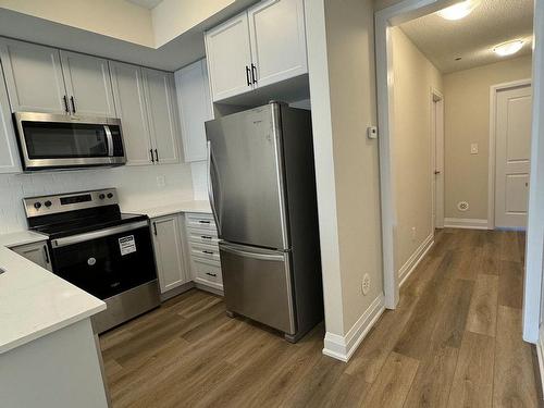 119-1573 Rose Way, Milton, ON - Indoor Photo Showing Kitchen