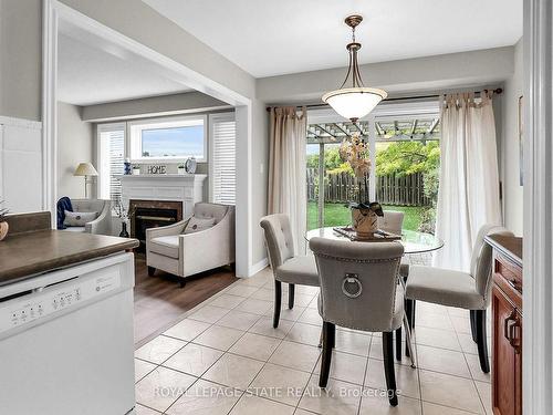 4104 Ashby Dr, Lincoln, ON - Indoor Photo Showing Dining Room With Fireplace