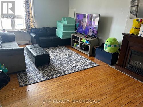 624-626 Division Street, Kingston (East Of Sir John A. Blvd), ON - Indoor Photo Showing Living Room With Fireplace