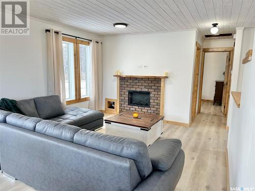 3 Morrow Place, Shell Lake, SK - Indoor Photo Showing Living Room With Fireplace