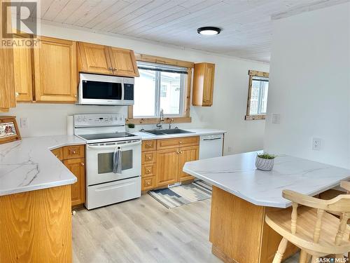 3 Morrow Place, Shell Lake, SK - Indoor Photo Showing Kitchen With Double Sink