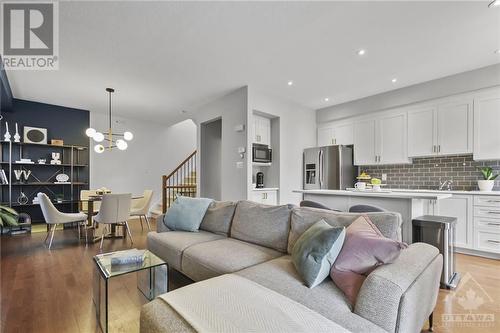 View from patio doors into living area - 109 Wild Senna Way, Ottawa, ON - Indoor Photo Showing Living Room