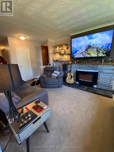 417 East Avenue E, Toronto (Rouge), ON - Indoor Photo Showing Living Room With Fireplace