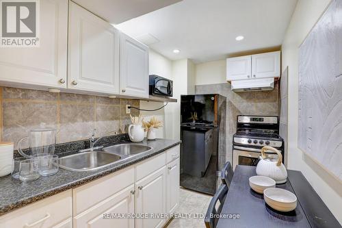 28 Wuthering Heights Road, Toronto, ON - Indoor Photo Showing Kitchen With Double Sink