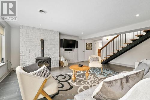 457 Wilson Drive, Hamilton Township, ON - Indoor Photo Showing Living Room With Fireplace