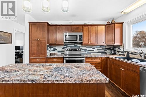 1023 Rorison Avenue, Moose Jaw, SK - Indoor Photo Showing Kitchen With Double Sink