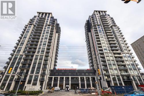 2004 - 202 Burnhamthorpe Road E, Mississauga, ON - Outdoor With Facade