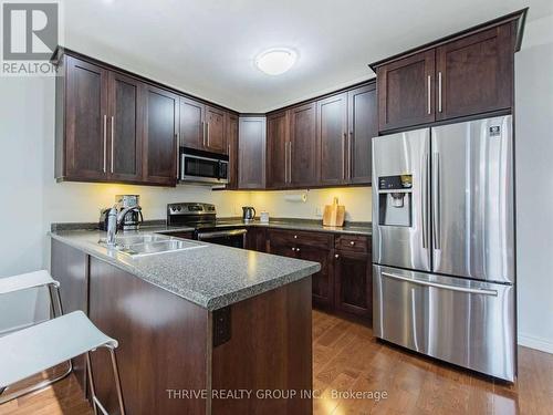 1043 Oakcrossing Gate, London, ON - Indoor Photo Showing Kitchen With Stainless Steel Kitchen With Double Sink