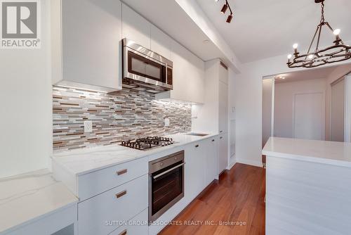 413 - 835 St Clair Avenue W, Toronto, ON - Indoor Photo Showing Kitchen With Upgraded Kitchen