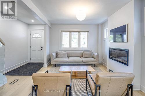 458 Donlands Avenue, Toronto, ON - Indoor Photo Showing Other Room With Fireplace