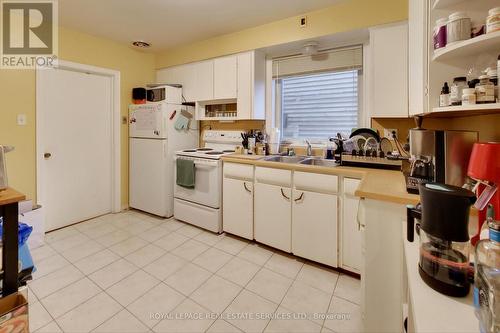 118 High Park Avenue, Toronto, ON - Indoor Photo Showing Kitchen With Double Sink