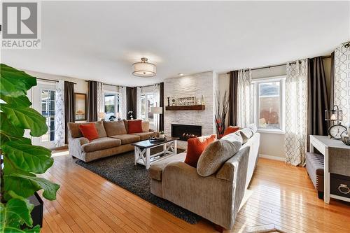 127 Grant Boulevard, Renfrew, ON - Indoor Photo Showing Living Room With Fireplace