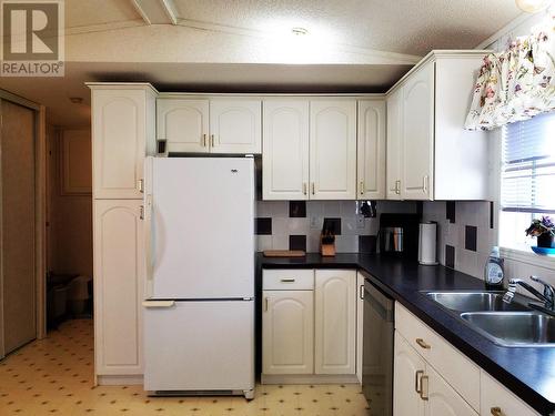 121 7817 S 97 Highway, Prince George, BC - Indoor Photo Showing Kitchen With Double Sink