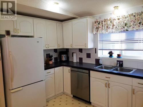 121 7817 S 97 Highway, Prince George, BC - Indoor Photo Showing Kitchen With Double Sink