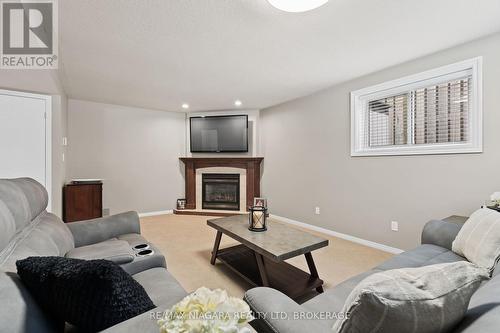 104 Whiteoak Crescent, Welland, ON - Indoor Photo Showing Living Room With Fireplace