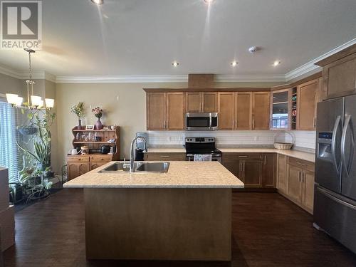 8211 88 Avenue, Fort St. John, BC - Indoor Photo Showing Kitchen With Stainless Steel Kitchen With Double Sink