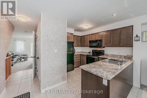 1A - 85 Mullin Drive, Guelph, ON - Indoor Photo Showing Kitchen With Double Sink