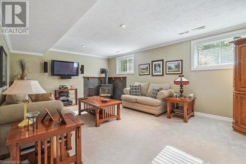 758169 Girl Guide Road, Georgian Bluffs, ON - Indoor Photo Showing Living Room With Fireplace