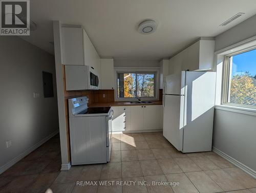 Upper - 9 Atkinson Avenue, Toronto, ON - Indoor Photo Showing Laundry Room