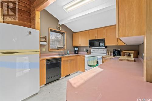 708 Tatanka Drive, Buffalo Pound Lake, SK - Indoor Photo Showing Kitchen With Double Sink