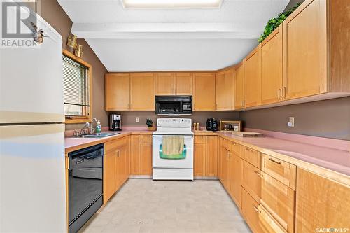 708 Tatanka Drive, Buffalo Pound Lake, SK - Indoor Photo Showing Kitchen With Double Sink