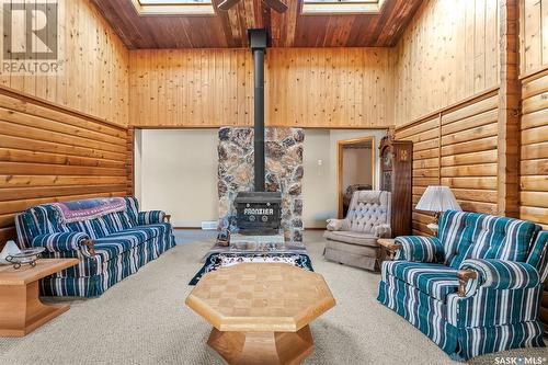 708 Tatanka Drive, Buffalo Pound Lake, SK - Indoor Photo Showing Living Room With Fireplace