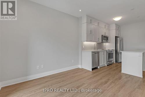 126 - 95 Dundas Street W, Oakville, ON - Indoor Photo Showing Kitchen With Stainless Steel Kitchen