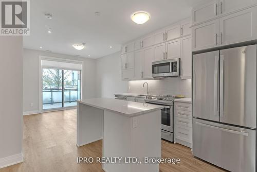 126 - 95 Dundas Street W, Oakville, ON - Indoor Photo Showing Kitchen With Stainless Steel Kitchen With Upgraded Kitchen