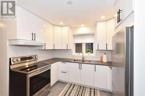 Main - 168 Strathnairn Avenue, Toronto, ON - Indoor Photo Showing Kitchen With Double Sink