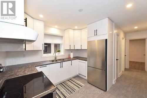 Main - 168 Strathnairn Avenue, Toronto, ON - Indoor Photo Showing Kitchen With Double Sink