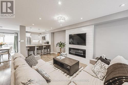 81 Mayland Trail, Hamilton, ON - Indoor Photo Showing Living Room With Fireplace