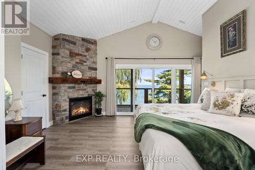 21 Pinery Lane, Georgina, ON - Indoor Photo Showing Bedroom With Fireplace